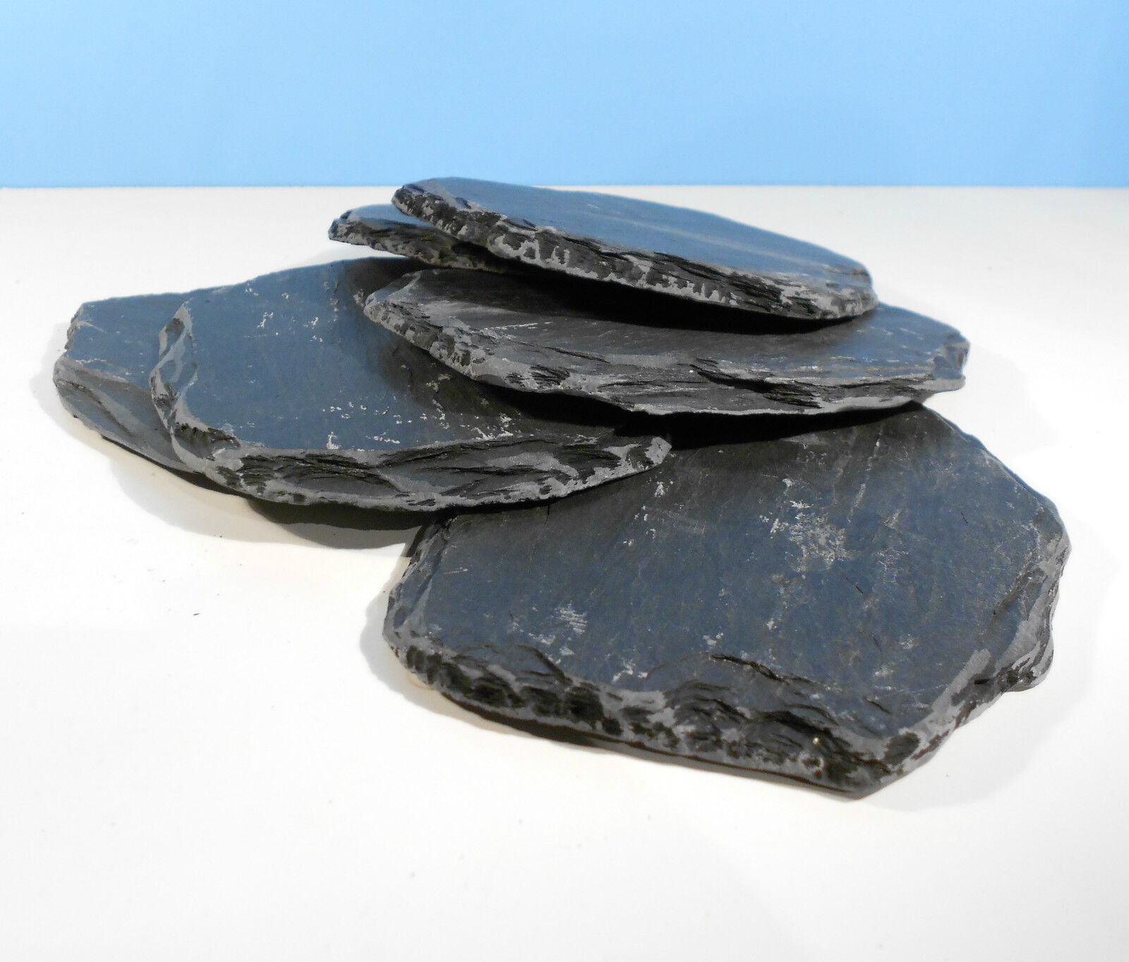 Four slate pieces.